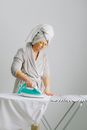 Woman in Gray Bathrobe