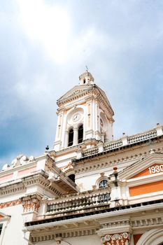 Stunning architectural details of the historic cathedral tower in Cuenca, Ecuador.