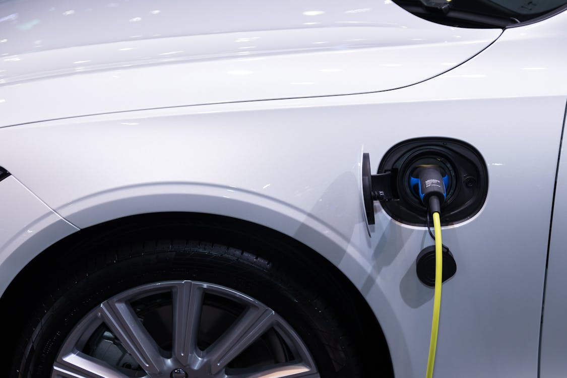 Free White Car Charging Stock Photo electric car