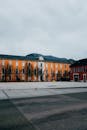 Orange and Red Buildings Under White Clouds