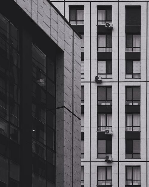 Free Black and white photo showcasing modern high-rise architecture in Chisinau, Moldova. Stock Photo