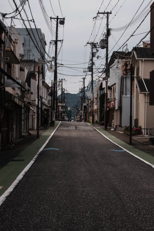 Free A serene, empty street in Wakayama Prefecture with traditional architecture. Stock Photo