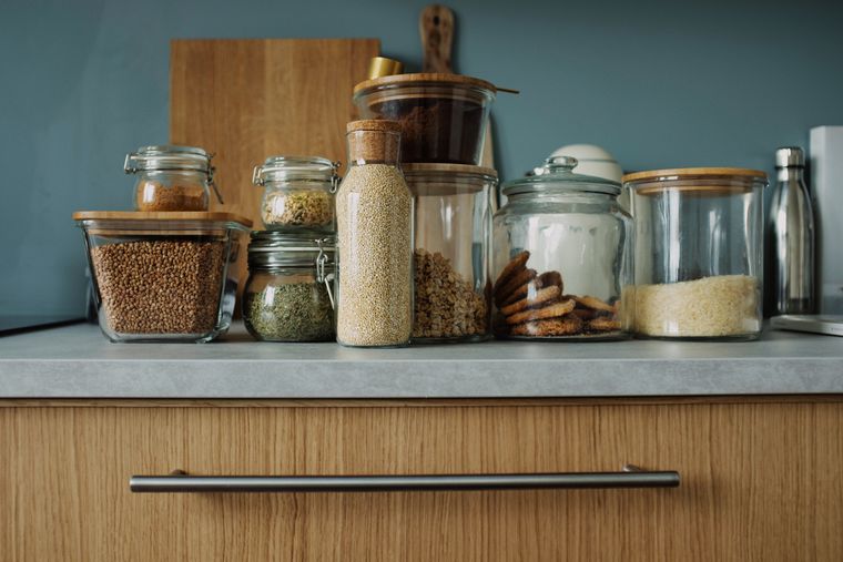 Kitchen counter lined with pantry storage jars — photo by ready made on Pexels