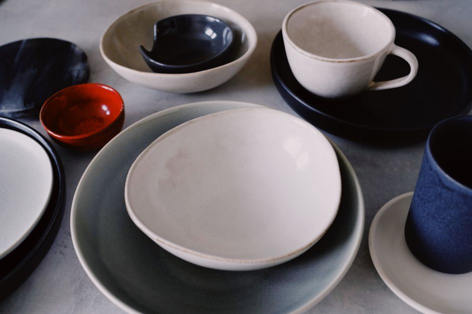 Colourful ceramic dishware arranged on a table