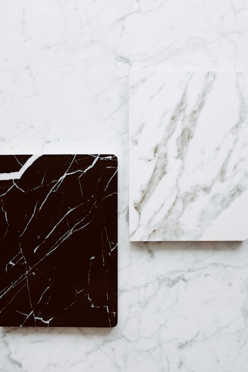 Free Stylish marble looking diaries on table Stock Photo