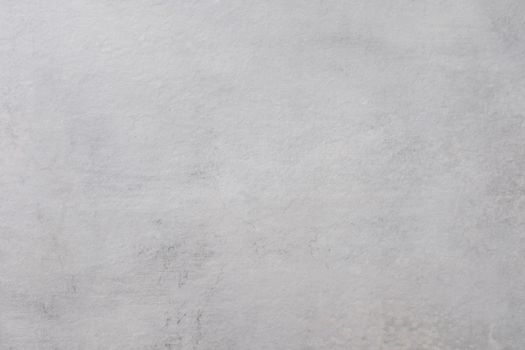Gray concrete wall texture perfect for backgrounds, offering a neutral and subtle surface design.