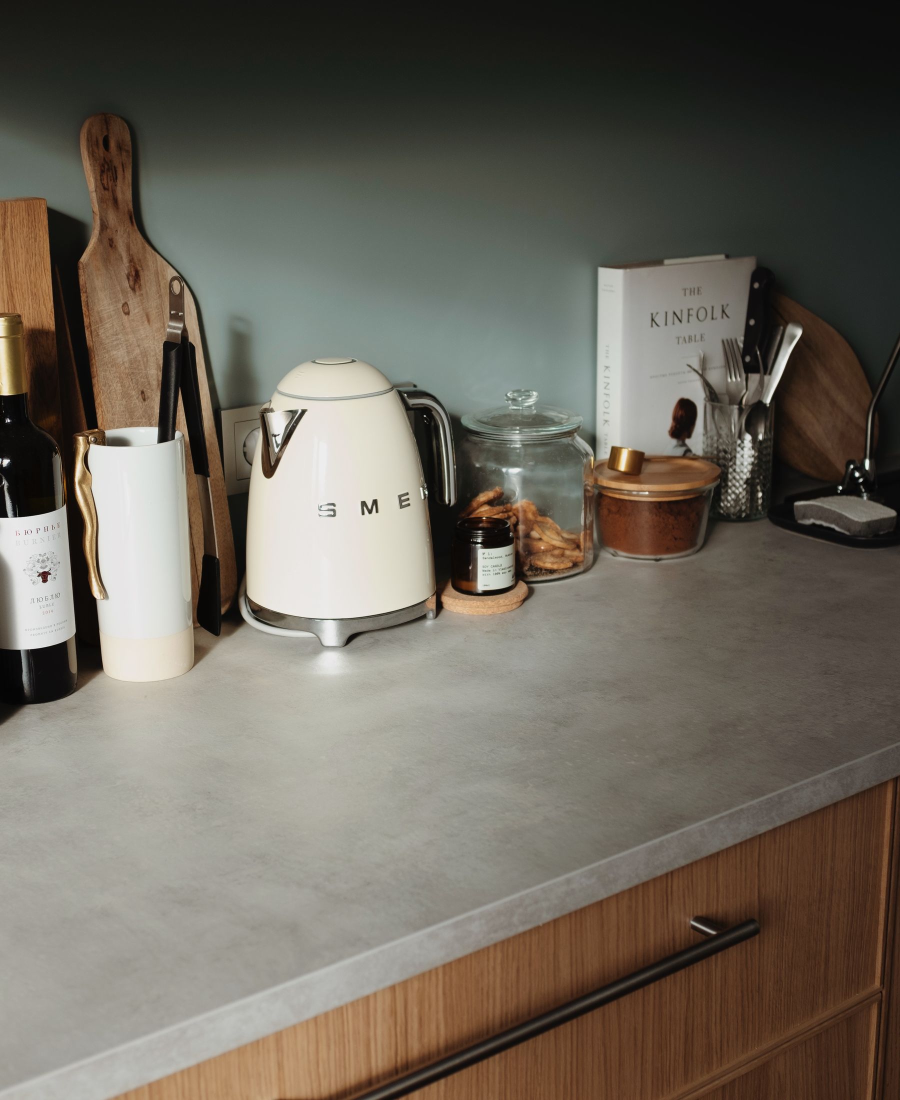 Modern kitchen counter with kettle and utensils