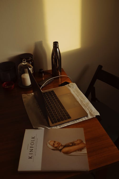 Workplace with laptop in apartment