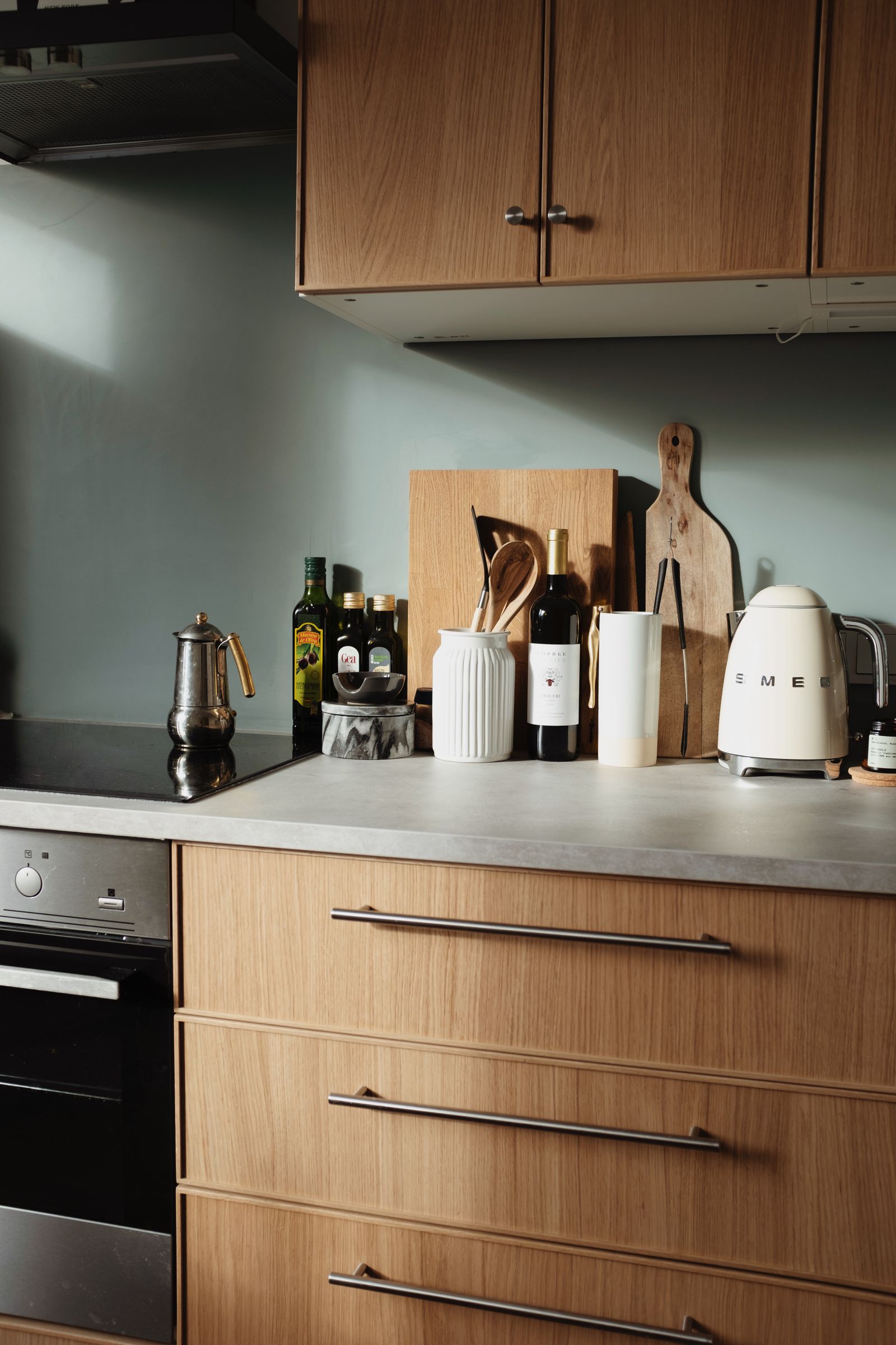 White electric kettle on a modern wooden kitchen countertop