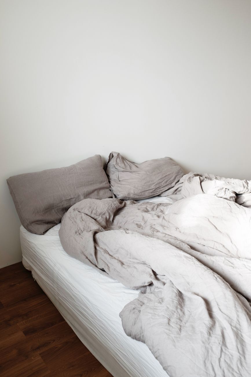 linen bedding styled on a bed