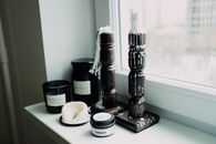 Stylish interior setup featuring melted candles on a window sill showcasing elegant decor.