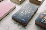 Composition of book on marble surface