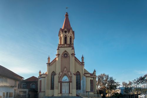 Free A stunning Gothic Revival church in a serene setting in Rio Grande do Sul, Brazil. Stock Photo