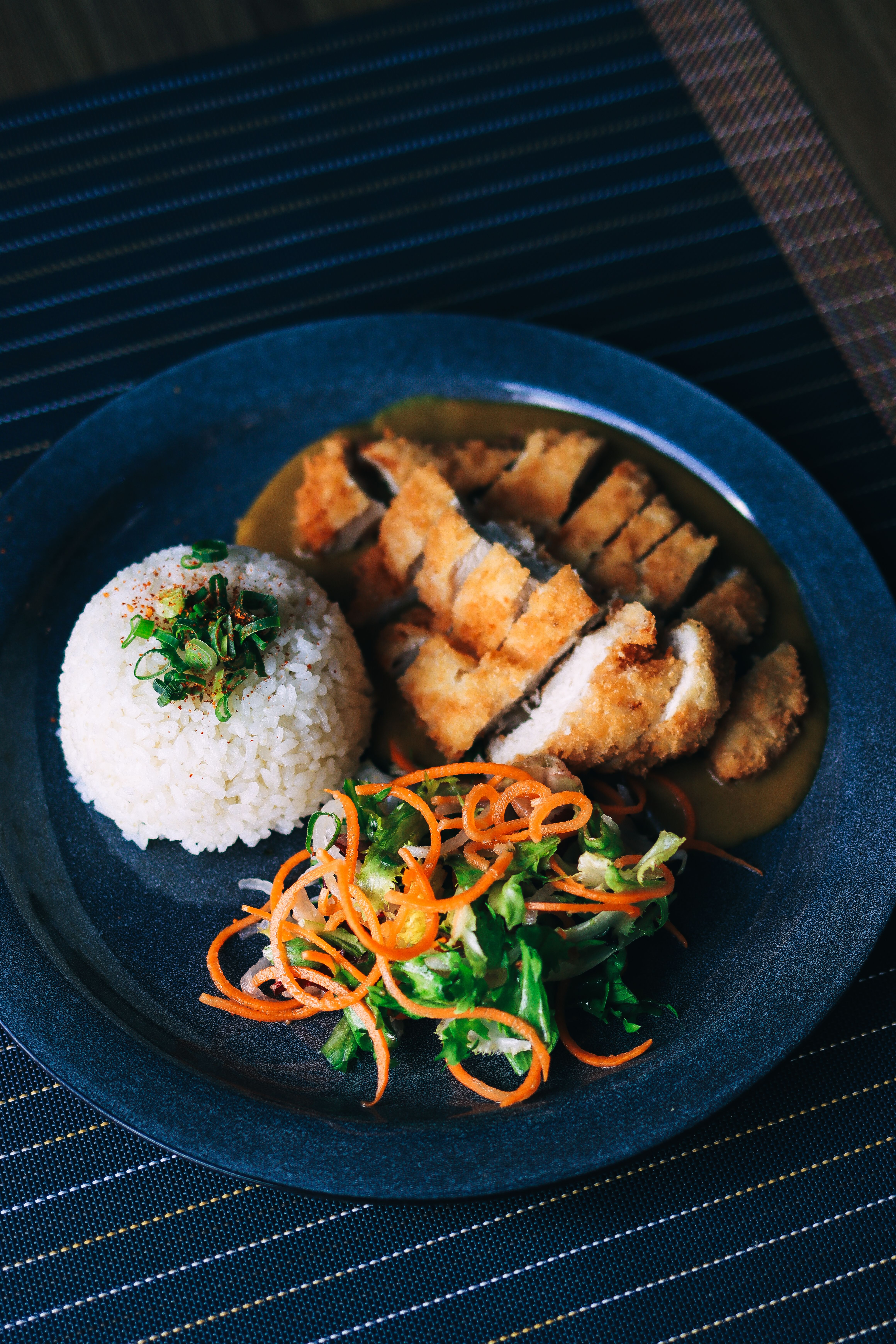 Crisp, panko-crusted fried chicken cutlets served with a tangy-sweet katsu sauce and shredded cabbage, the classic Japanese comfort food.
