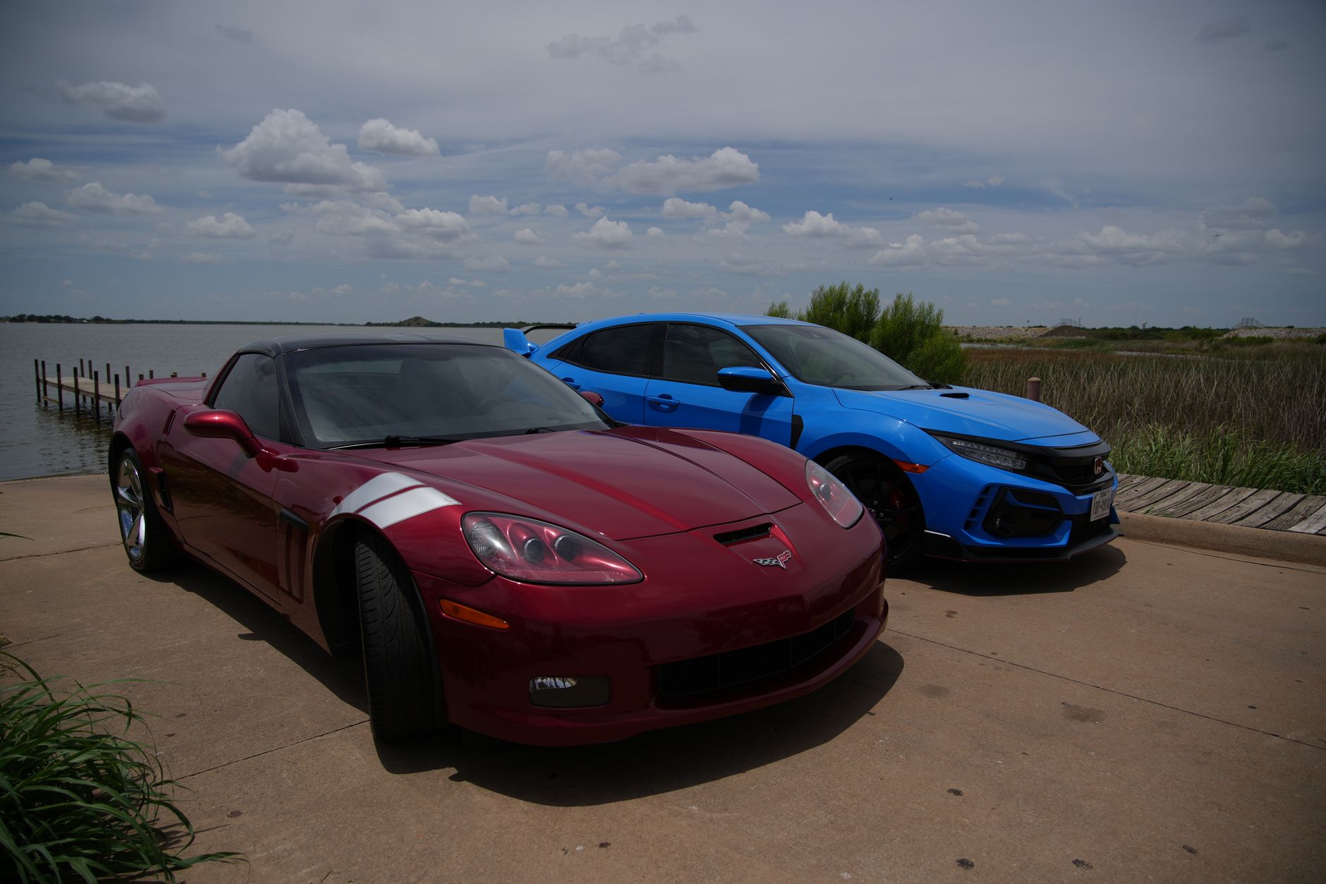A Chevrolet Corvette and Honda Civic Type R by a lake in Wichita Falls, Texas.