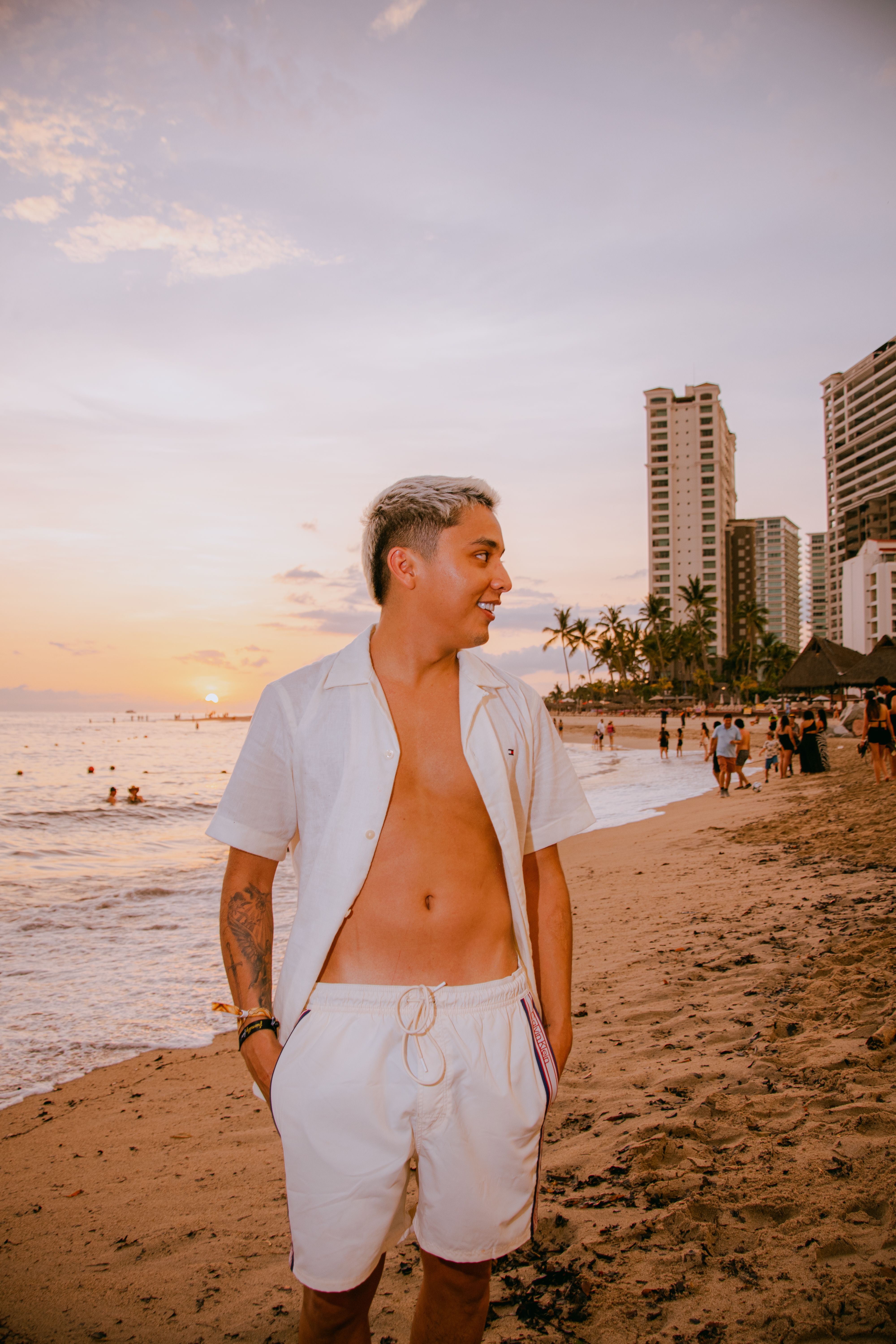Fashionable person enjoying a sunset at Puerto Vallarta beach, Jalisco, Mexico.