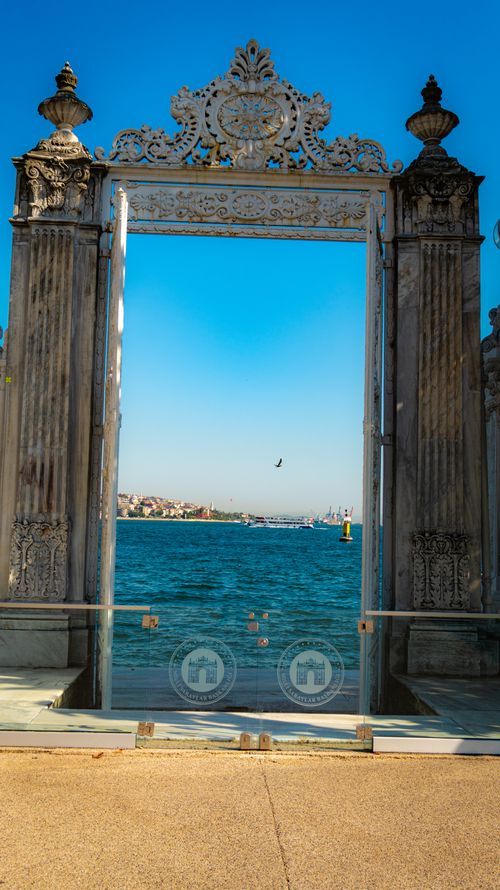 Free View through an ornate gate to the Bosphorus Strait with a clear blue sky. Stock Photo