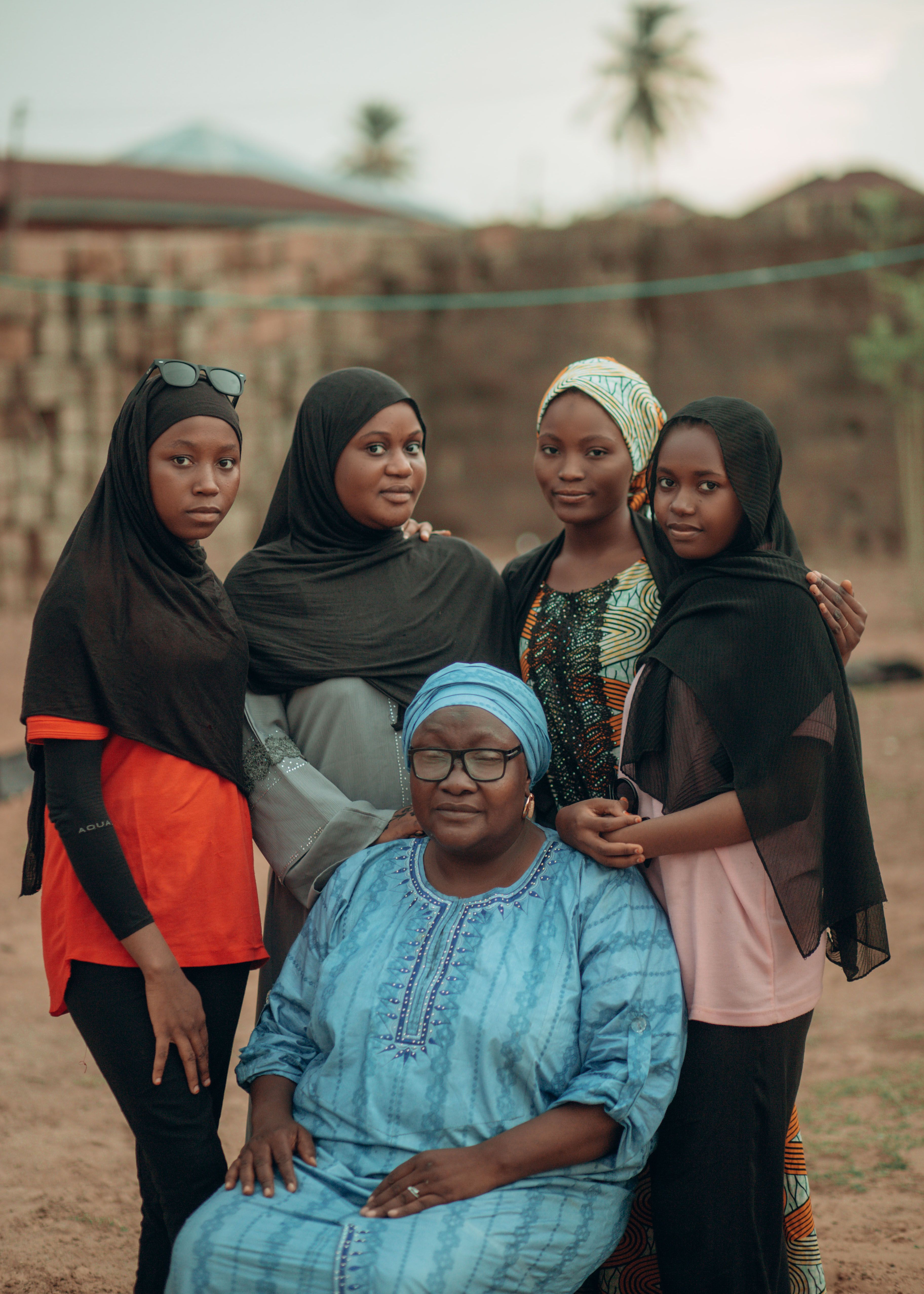 A heartwarming portrait of African women in traditional attire, showcasing vibrant cultural heritage.