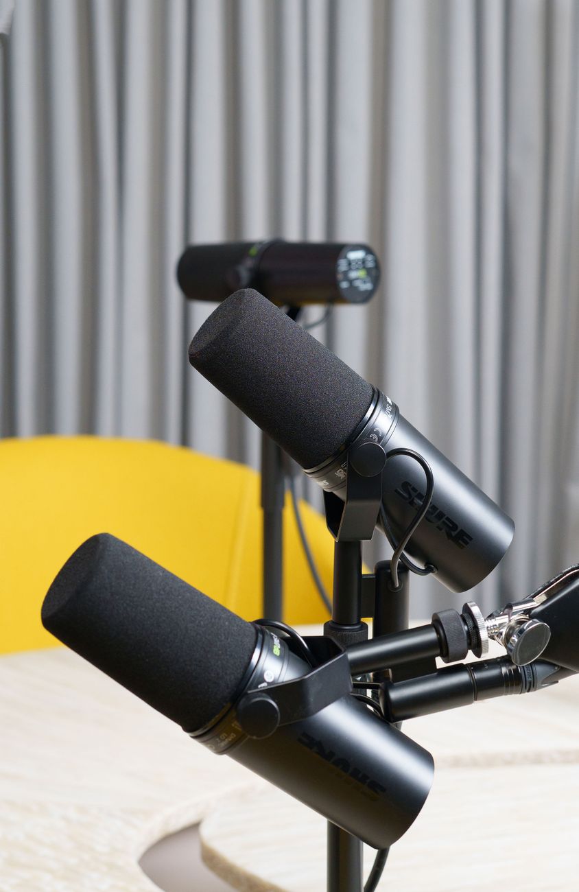 High-quality studio microphones set up for podcasting, ideal for broadcasting and recording.