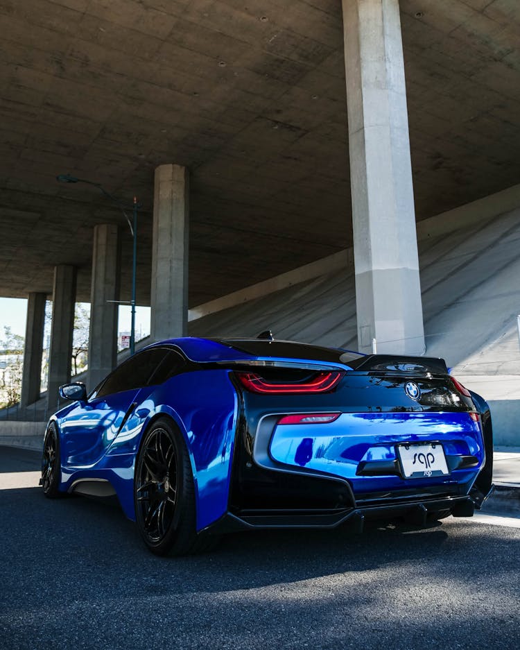 Blue Bmw Parked Under The Bridge