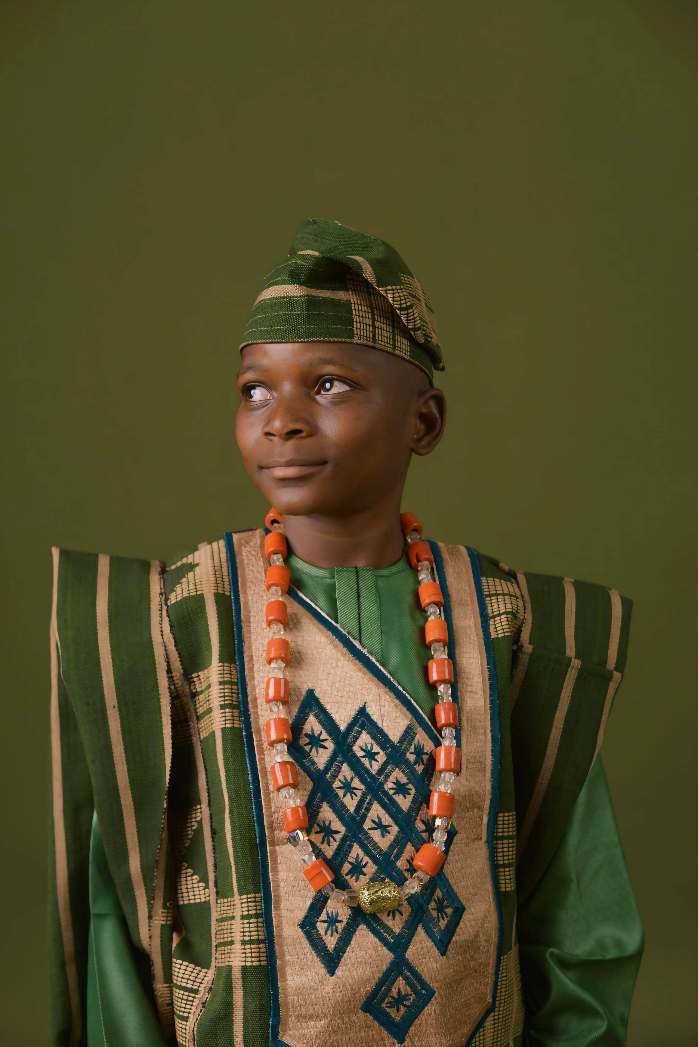 A young boy in traditional Yoruba dress from Osogbo, Osun, Nigeria.