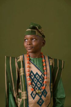 A young boy in traditional Yoruba dress from Osogbo, Osun, Nigeria.