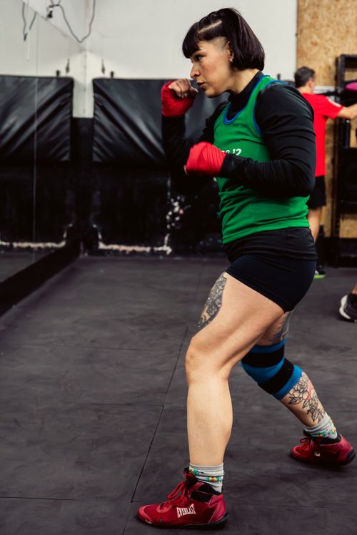 Free A focused female boxer training in a gym in Buenos Aires, showcasing strength and determination. Stock Photo
