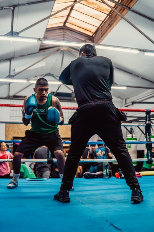 Free Boxers engage in a focused training session at a gym in Buenos Aires, Argentina. Stock Photo