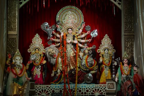 Free Colorful display of Durga Puja idols featuring Goddess Durga and her companions. Stock Photo