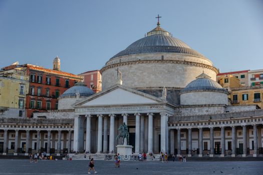 Stunning view of Basilica San Francesco di Paola in Naples with vibrant architecture in daylight.