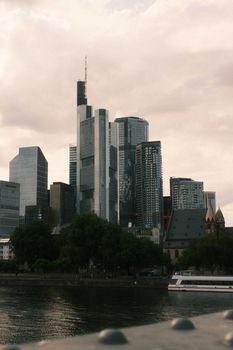 Captivating view of Frankfurt's iconic skyline with the Commerzbank Tower in summer.