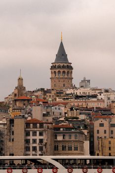 Historic Galata Tower rises above Istanbul's cityscape, showcasing architectural beauty.