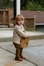 Little Kid Holding Wooden Log