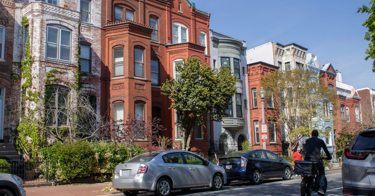 Beautiful brownstone row houses on a sunny street in Washington D.C.
