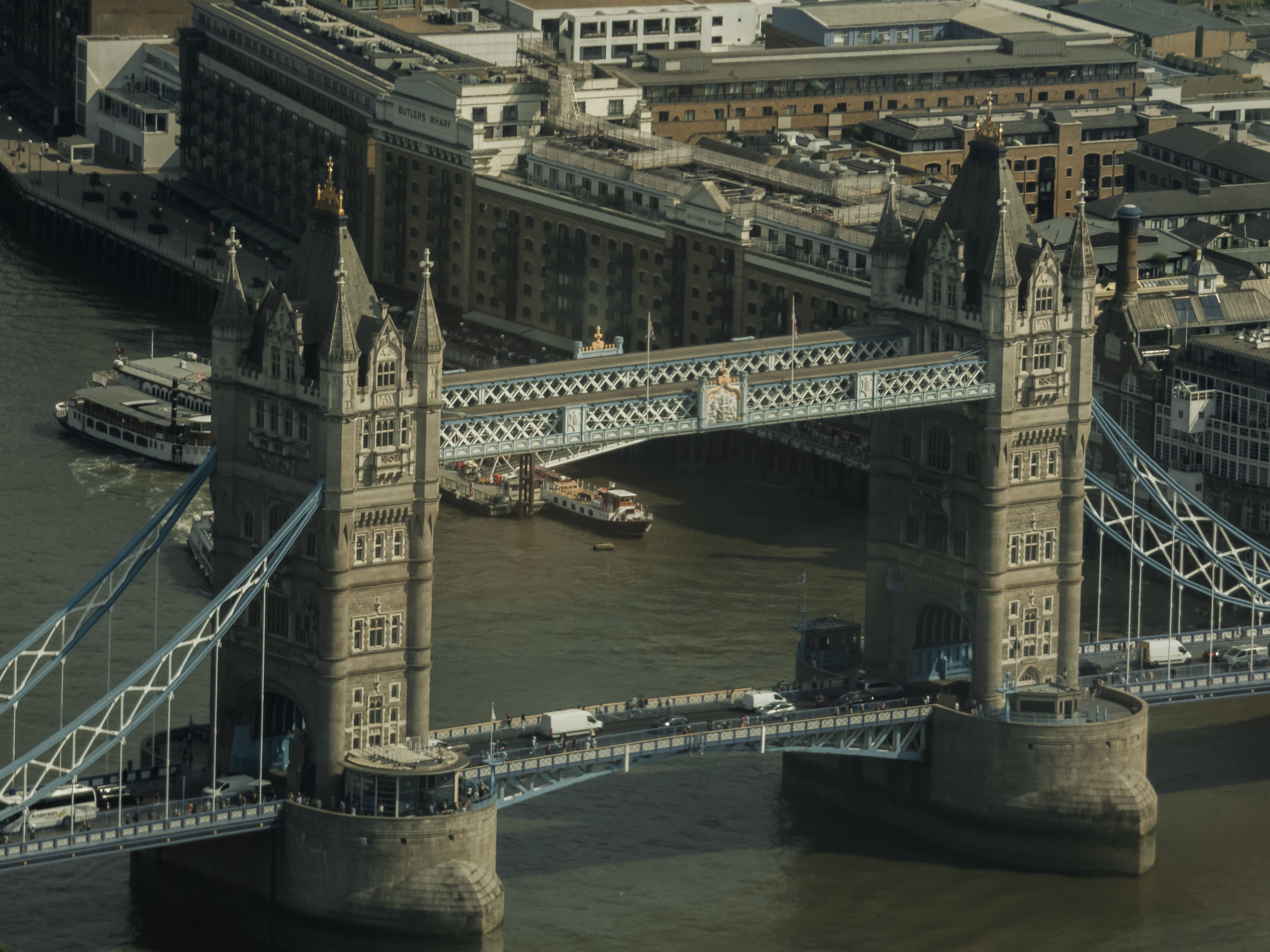 Scenic aerial view of Tower Bridge crossing the Thames River in London, England.