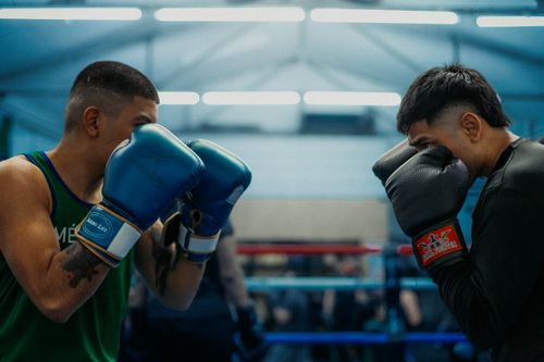 Free Two boxers sparring in a gym, showcasing intense focus and energy in Buenos Aires, Argentina. Stock Photo