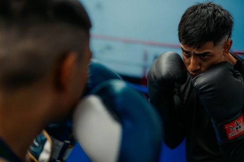 Free Focused boxers sparring in a gym, showcasing intense practice and technique. Stock Photo