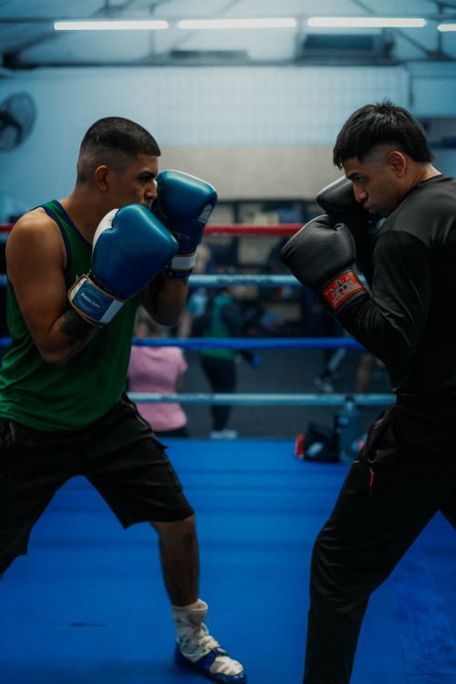 Free Two men face off in a boxing ring in Buenos Aires, Argentina, showcasing skill and intensity. Stock Photo