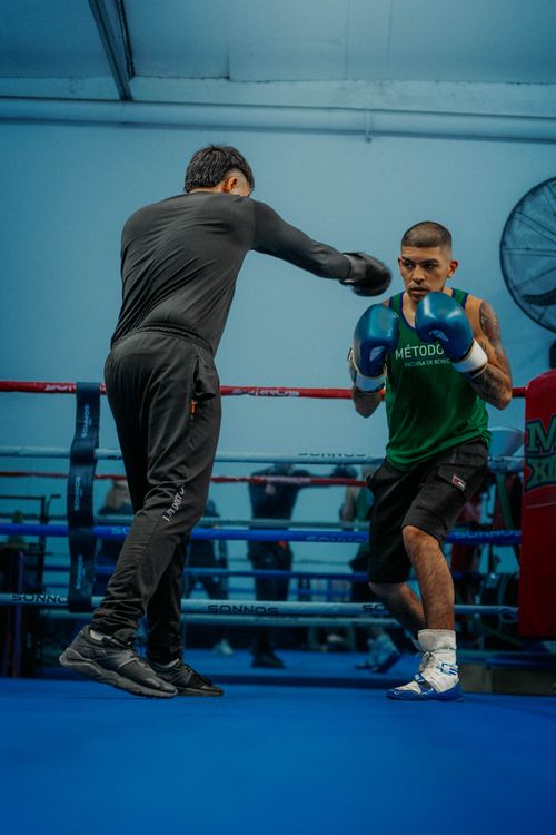 Free Dynamic boxing training session in a Buenos Aires gym captures intensity and skill. Stock Photo
