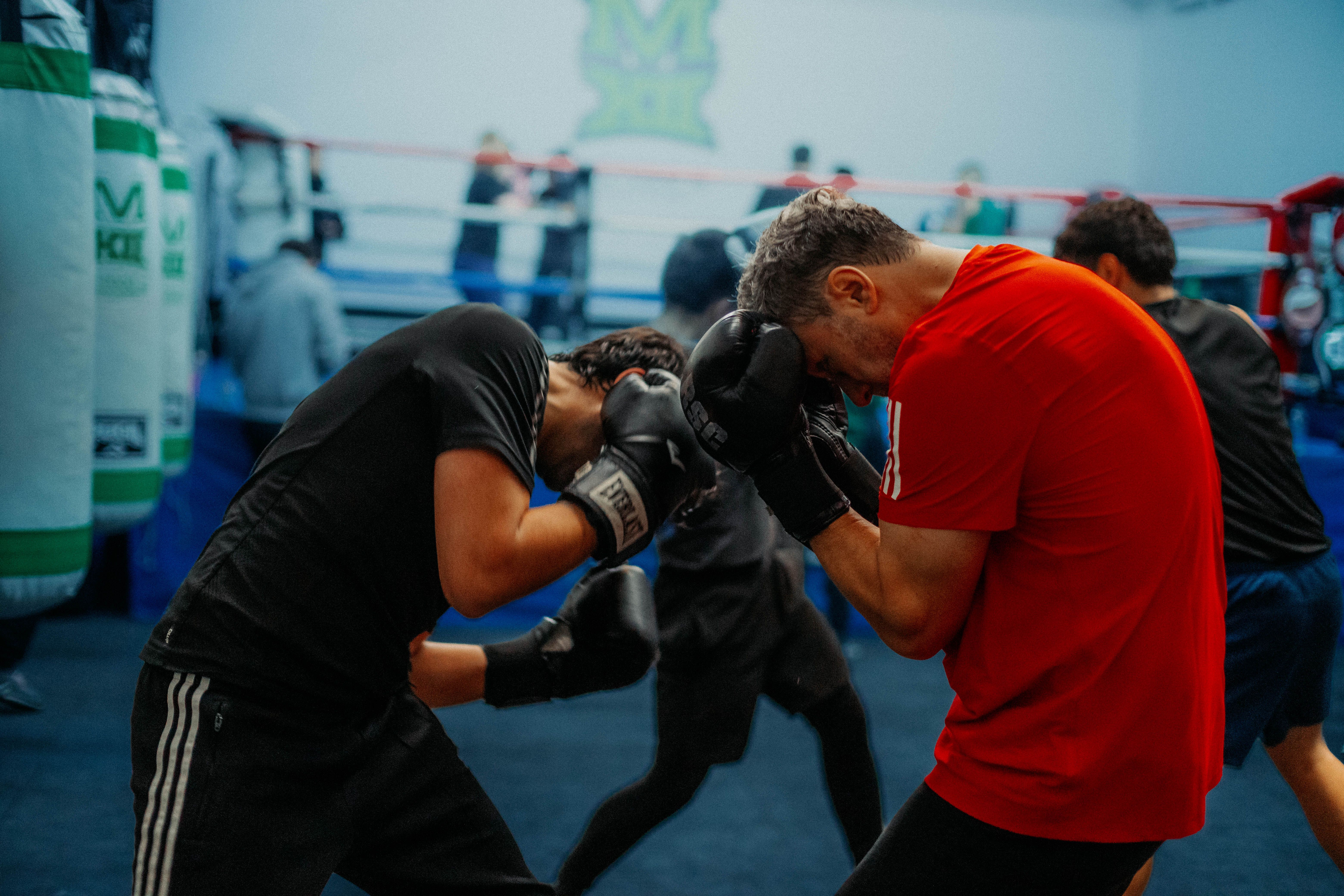 Boxers in intense sparring session at a gym in Buenos Aires, Argentina.