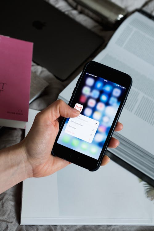 Person Holding Black Smartphone