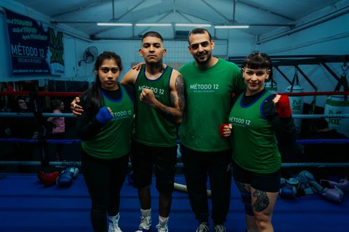 Free A diverse boxing team in a Buenos Aires gym ready for training, showcasing unity and strength. Stock Photo
