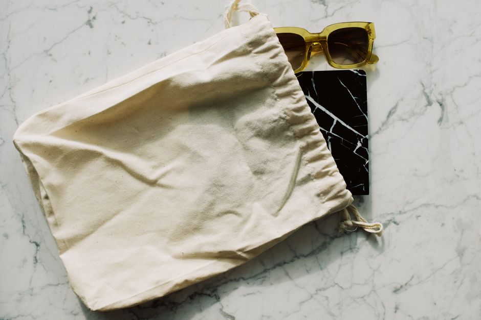 bag and notebook by the door natural light lifestyle photo 1