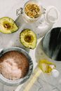 Fresh avocado slices with seed mix and other ingredients for healthy breakfast