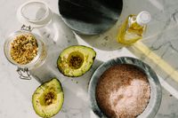 Fresh avocado and healthy breakfast ingredients