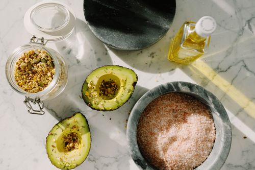 Fresh avocado and healthy breakfast ingredients