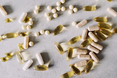 Various vitamins and supplements flat lay