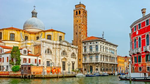 Free Capture the essence of Venice with this stunning view of historic architecture along a charming canal. Stock Photo
