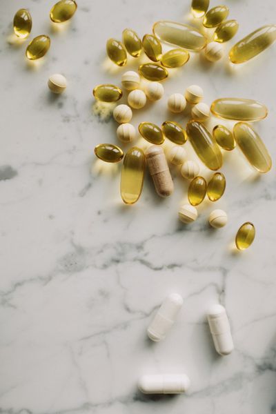 Vitamin D supplement capsules in sunlight