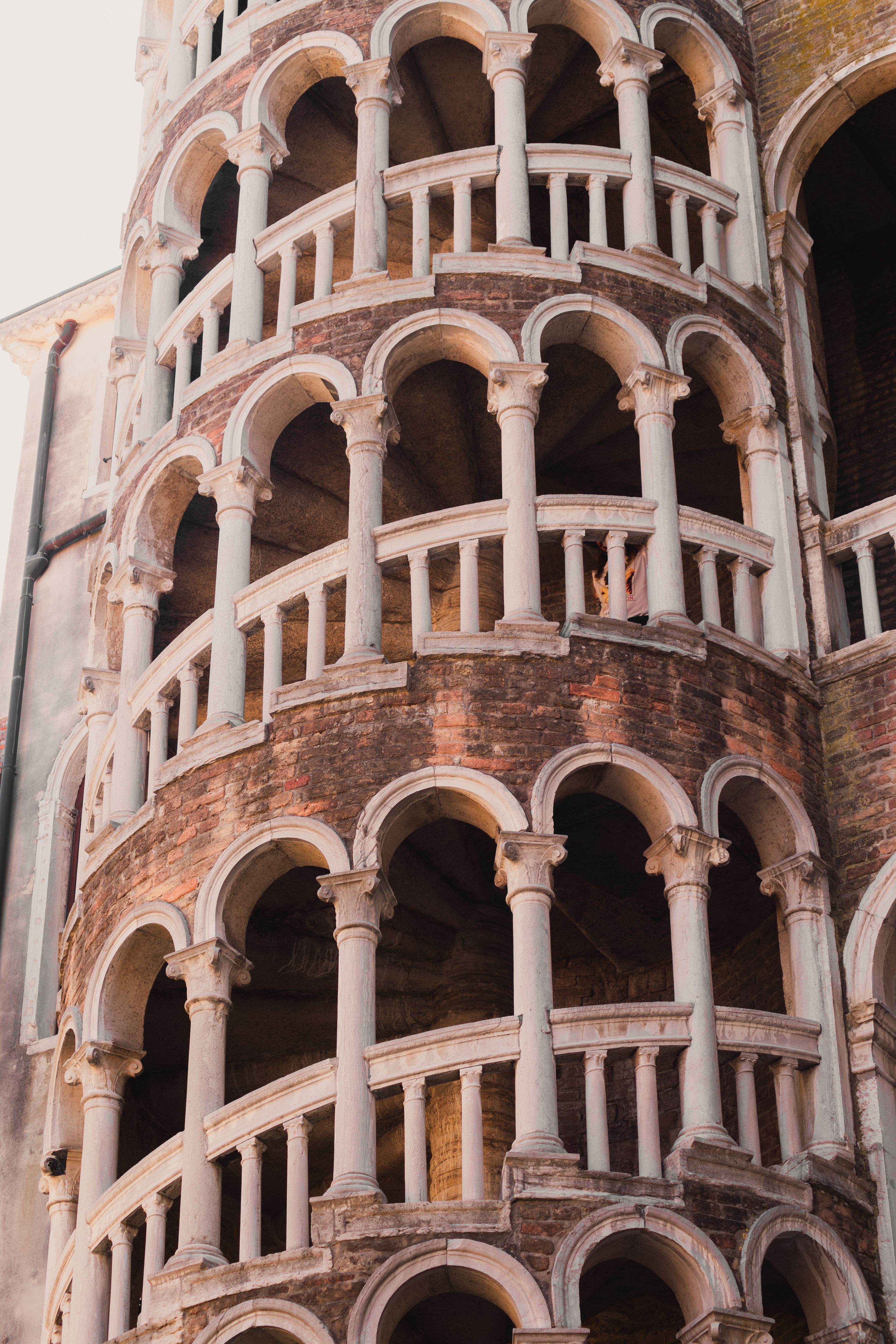 Close-up of the spiral staircase at Scala Contarini del Bovolo, Venice's architectural marvel.